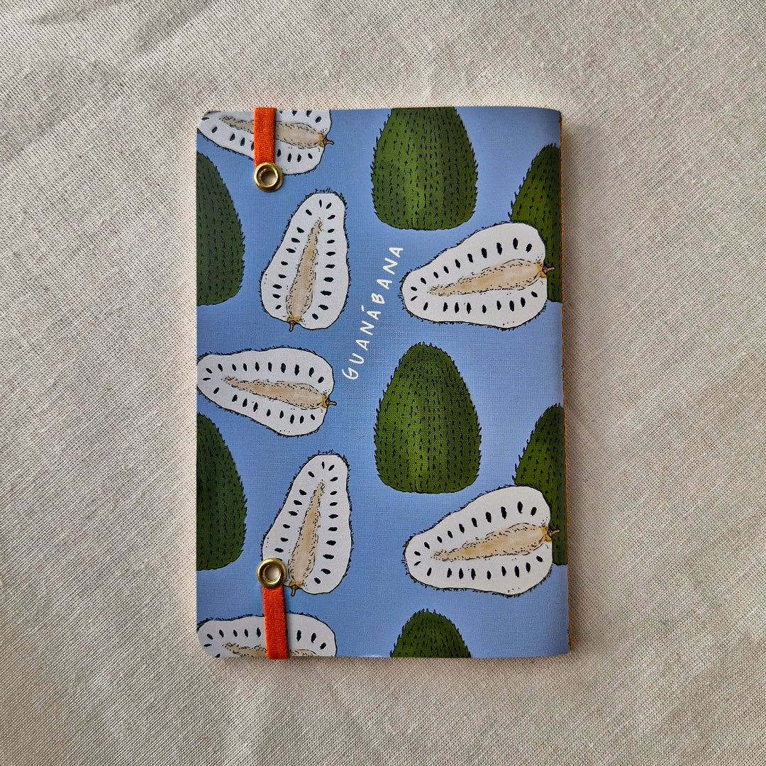 Reverso de libreta ilustrada con guanábanas